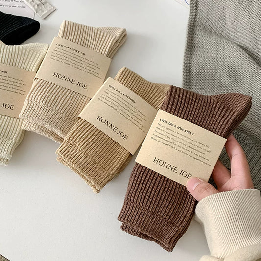 Dcxecsx | Women’s Mid-Calf Cotton Socks with Thick Knit Construction for Comfortable Autumn and Winter Wear 2026